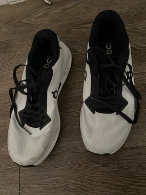 On Running Men’s White and Black Athletic Running Shoes